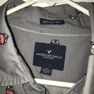 Men’s short sleeve button down.